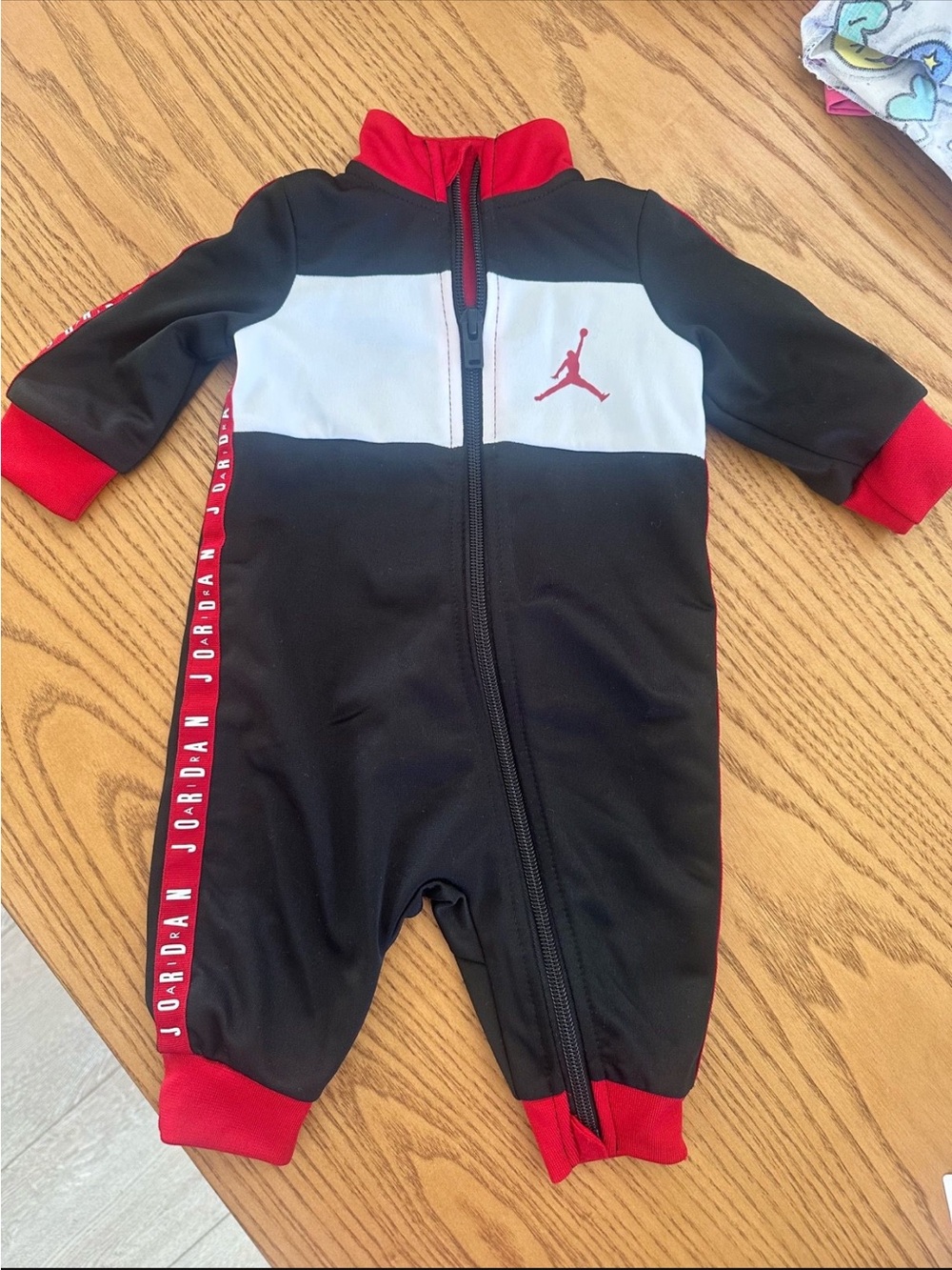 Jordan Black, Red & White Zip One-Piece Footie
